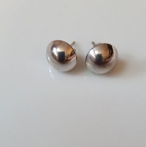 Silver toned button post earrings